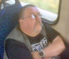 Ian Shergold dossed on train 