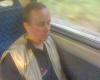 Phil Marquis dossed on train